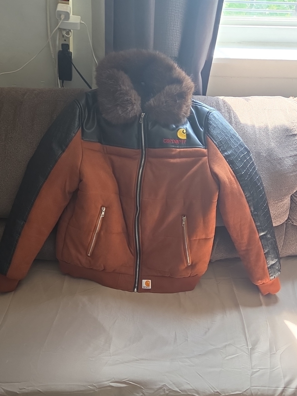 Carhartt Brown Puffer Jacket with Black Quilted Sleeves and Fur Collar
